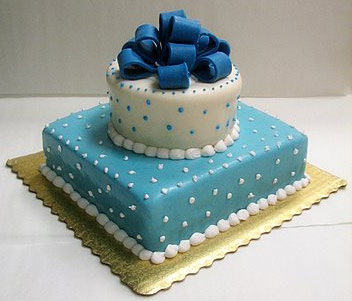 Blue Tuxedo Cake, with blue ribbon atop