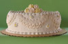 Something Sweet's Pageant Cake with fancy draped frills